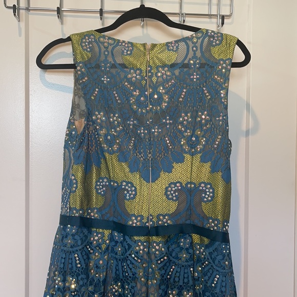 Beautiful Jovani peacock colored dress with embellishments. Worn once. - Picture 7 of 8